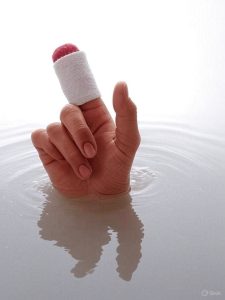 productivity and employee well-being. OSHA’s expanded data collection now allows for more detailed analysis of injury circumstances, enabling better prevention strategies. Innovations in Laceration Protection Advancements in materials science and PPE design have transformed laceration protection. Traditional leather or thick knit gloves have given way to modern materials such as high-performance fibers (aramid, ultra-high molecular weight polyethylene), which offer superior cut resistance without sacrificing comfort or dexterity. These innovations are critical for compliance with OSHA standards and for reducing injury rates. While the U.S. government does not regulate the specific materials used in PPE, OSHA and the National Institute for Occupational Safety and Health (NIOSH) provide guidelines and recommendations for selecting appropriate protective gear. Employers are encouraged to choose PPE that meets or exceeds industry standards, such as those set by the American National Standards Institute (ANSI) for cut-resistant gloves. Best Practices for Laceration Prevention Preventing workplace lacerations requires a multi-faceted approach: • Hazard Identification and Control: Regularly assess work environments to identify potential laceration hazards, such as exposed blades, poor lighting, or clutter. ©2025 Spellbound Development Group, Inc.